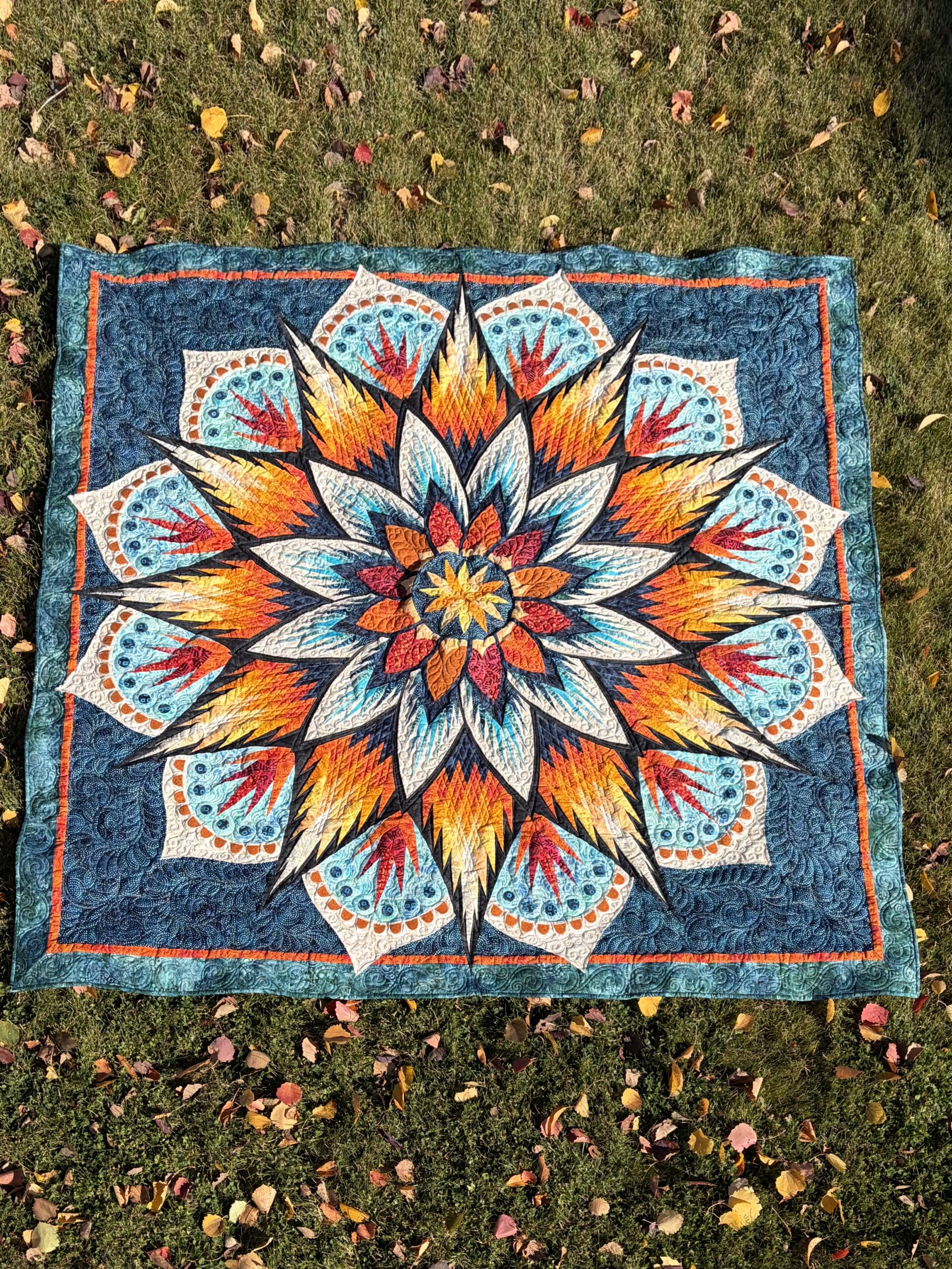 Carnival Flower (wall size) from Riley Blake fabrics. Quilted by Joyce Fukumoto.